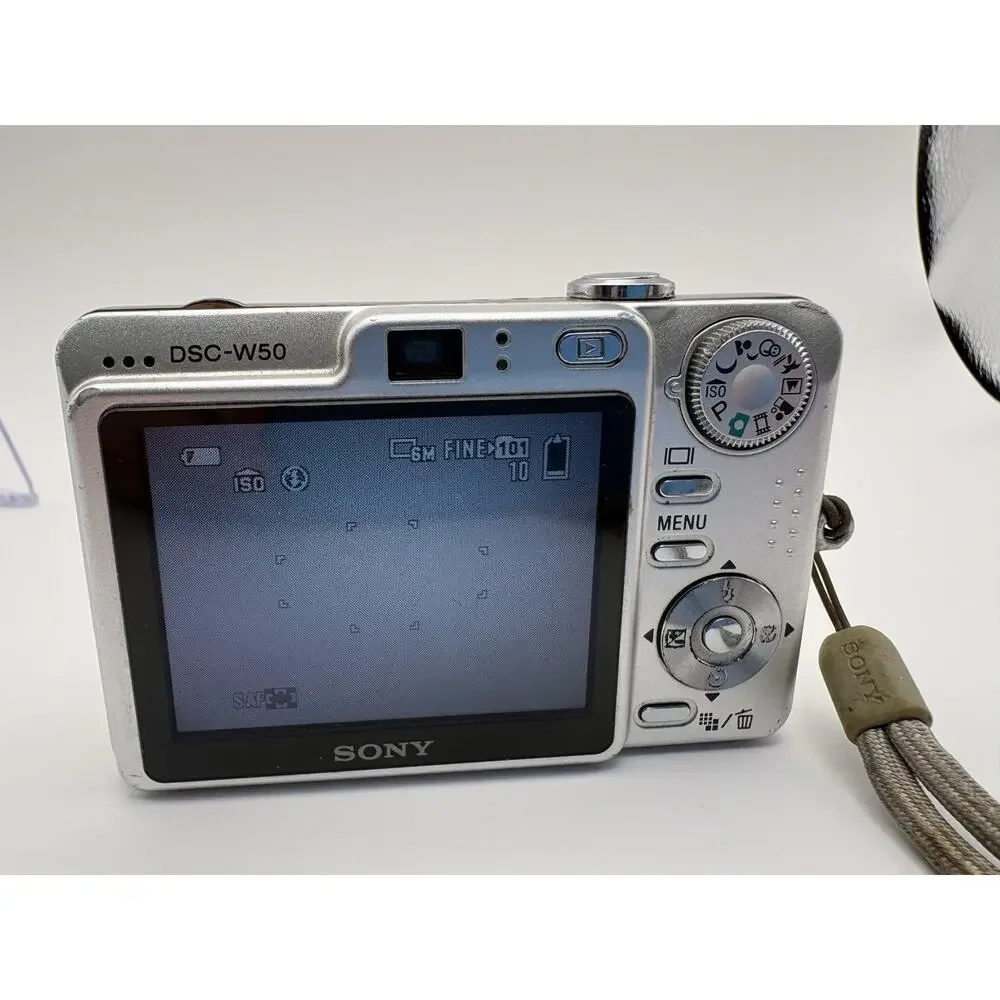 Sony Cyber-shot DSC W50 6.0MP Silver Digital Camera Bundle For Parts Not Working